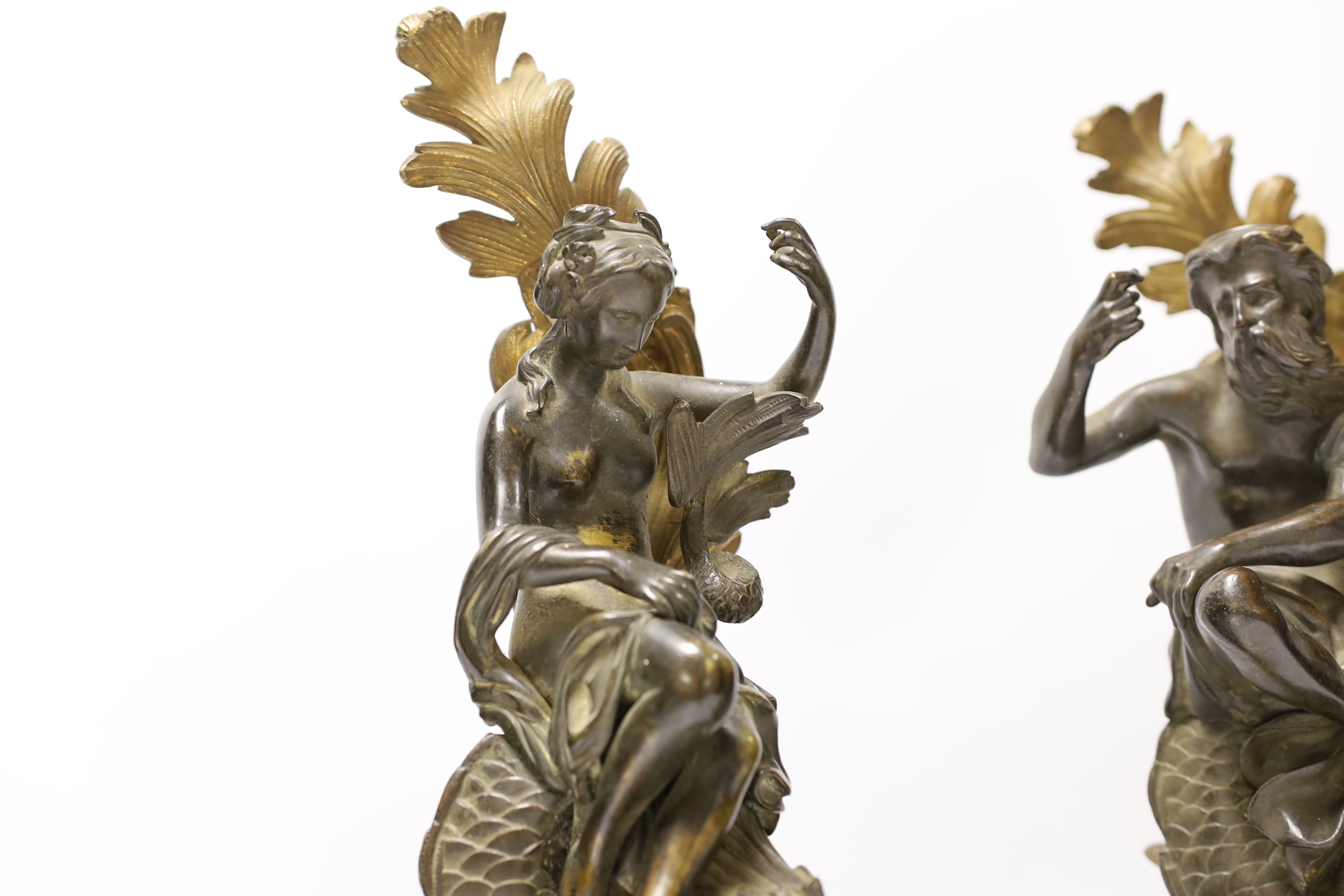 A pair of late 19th century bronze and ormolu figures of Poseidon and Amphitrite, 39cm